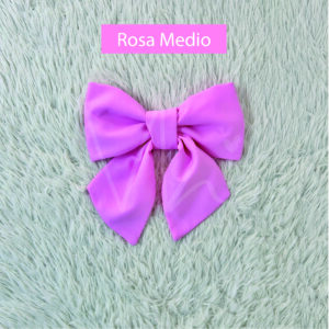 Moño de tela rosa medio