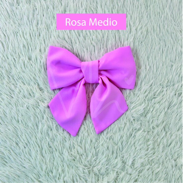 Moño de tela rosa medio
